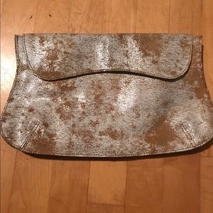 Anthropologie metallic gold clutch